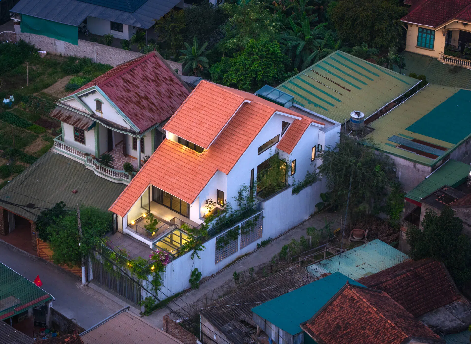 +House – Ngôi nhà ziczac trên khu đất xiết nở hậu | Nguyen Khac Phuoc Architects